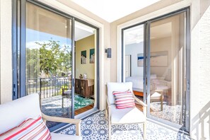 Terrace/patio - Gertrude's Siesta | 6 Terraces, Rooftop, Pool, 1-min to Beach and Village! (Siesta Key)