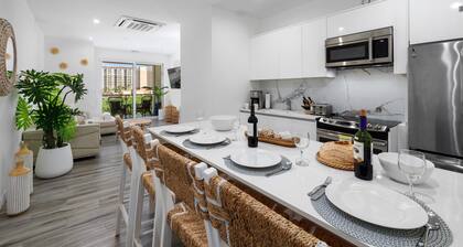 Steps from Palm Beach • Rooftop Pool • Spacious, Modern & Fully Equipped