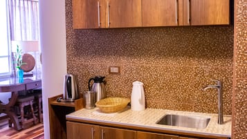 Apartment | Private kitchen | Mini-fridge, microwave, cookware/dishes/utensils, cleaning supplies