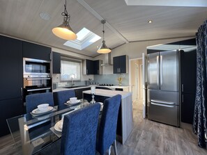 Fridge, microwave, oven, cookware/dishes/utensils