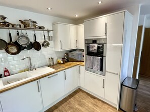 Casa superior, baño privado | Cocina privada