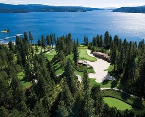 A golf course with a lake in the background. - Big Comfort, Big Fun, Big Family Memories (Coeur d'Alene)