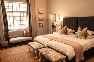 Habitación Deluxe | 1 dormitorio, caja fuerte, decoración individual y mobiliario individual