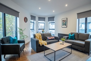 Premier Apartment, 2 Bedrooms, City View | Living area | 40-inch Smart TV with satellite channels, TV
