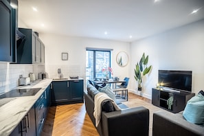Premier Apartment, 2 Bedrooms, City View | Living area | 40-inch Smart TV with satellite channels, TV