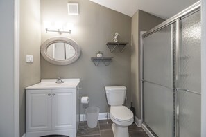 Combined shower/tub, hair dryer, towels, soap