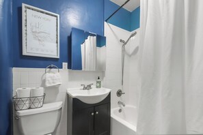 Combined shower/tub, hair dryer, towels, soap