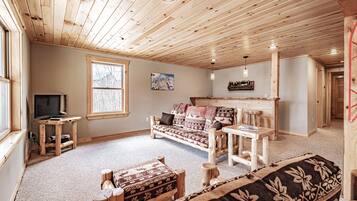 Smart TV, fireplace, foosball