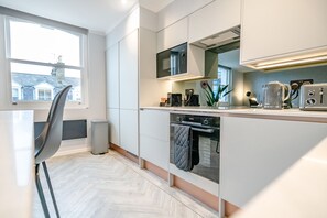 Appartement Luxe, 1 lit double et 1 canapé-lit, vue ville | Cuisine privée