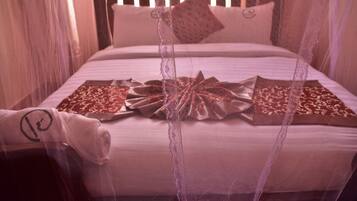 2 bedrooms, individually decorated, individually furnished, desk