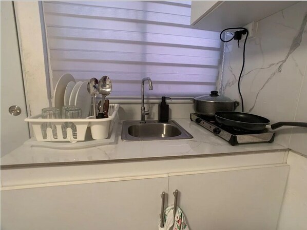 Fridge, microwave, oven, cookware/dishes/utensils