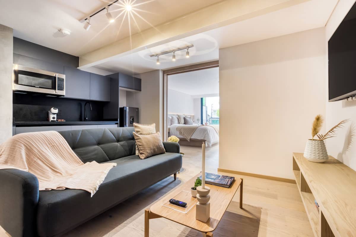 Superior Apartment with Balcony | Living area | 50-inch Smart TV with digital channels, TV, Netflix