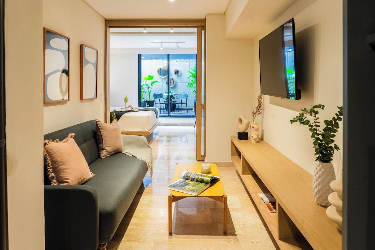Premier Apartment | Living area | 50-inch Smart TV with digital channels, TV, Netflix