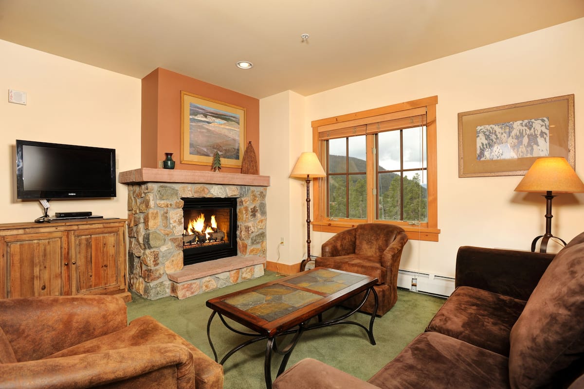 Condo, 2 Bedrooms (with Murphy Bed) | Living area | Flat-screen TV