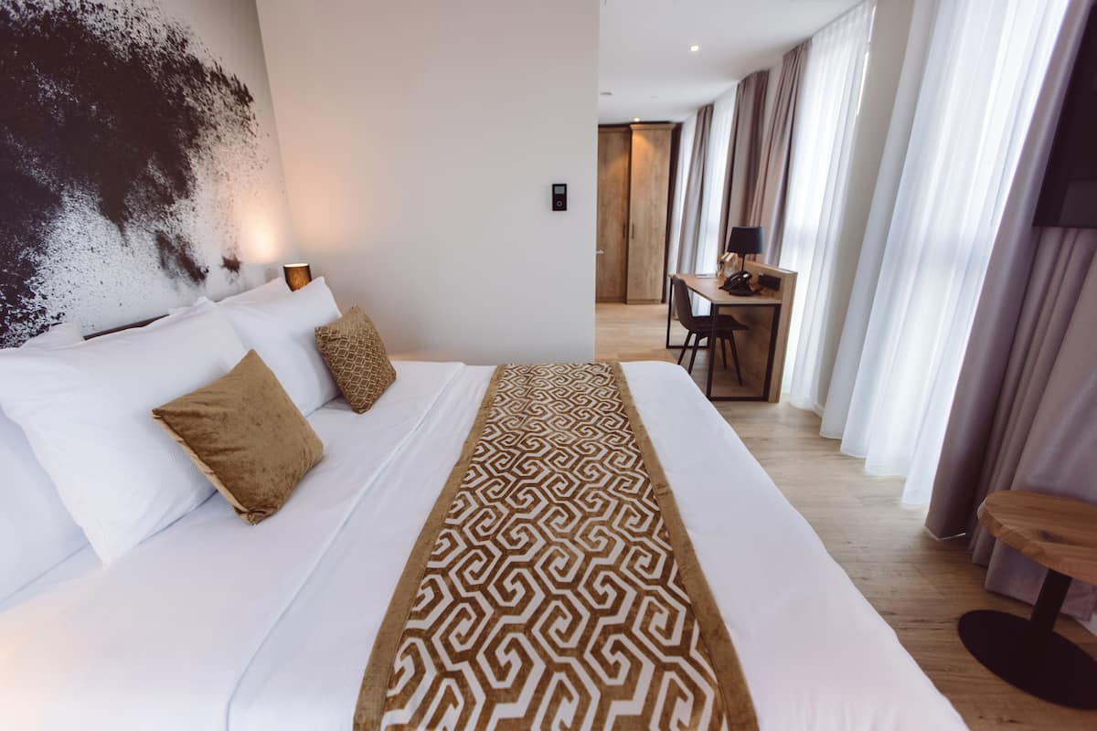 1 habitación, ropa de cama de alta calidad y escritorio