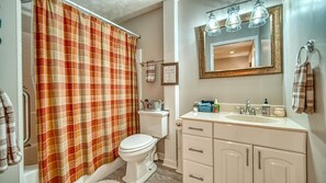 Combined shower/tub, hair dryer, towels, soap