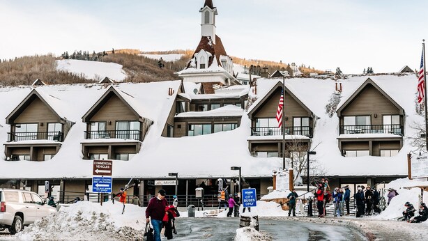 A lodge with multiple balconies and a prominent church steeple. - Lodge at Mtn Village B156 | Ski-In/Out | Valley View | Pool | Hot Tub (Park City)