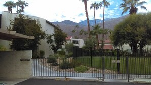 Surrounded by lush vegetation and a majestic mountain range, this gated community offers scenic views.