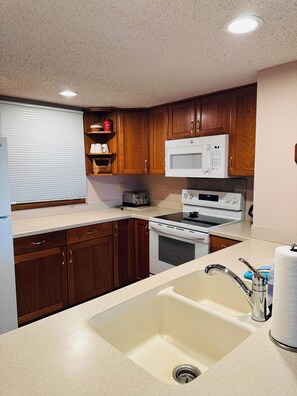 Fridge, microwave, oven, stovetop - Spacious Group Condo w/ Sauna | Tubing, Pool & Shuttle (Bellaire)