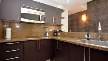 Fridge, microwave, stovetop, coffee/tea maker