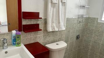 Studio Suite, 1 Double Bed, Patio, City View | Bathroom | Shower, hair dryer, towels