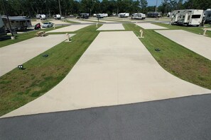 Property grounds - RV Lot at Whispering Pines RV Resort - 5 Miles to the Beach! (Gulf Shores)