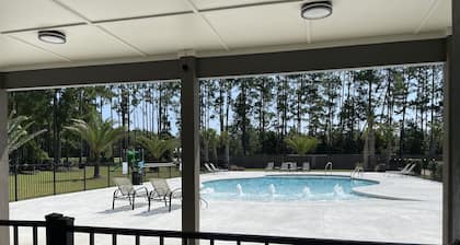 RV Lot at Whispering Pines RV Resort - 5 Miles to the Beach!