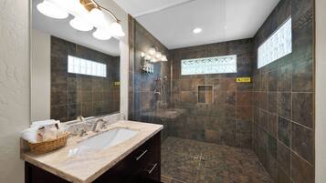 Shower, towels, soap, toilet paper