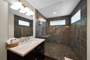 Shower, towels, soap, toilet paper