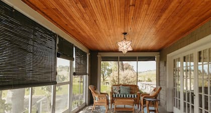 Main Residence: 5 beds, 5 baths, sleeping porches, & full kitchen.