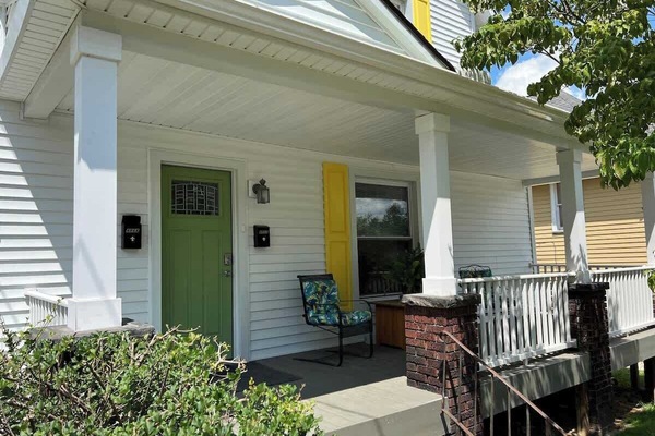 This is the front of the house as your face it from the street. Your entrance is around the back.