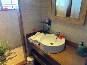 Shower, hair dryer, towels, soap