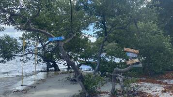 On the beach, white sand, free beach cabanas, sun-loungers