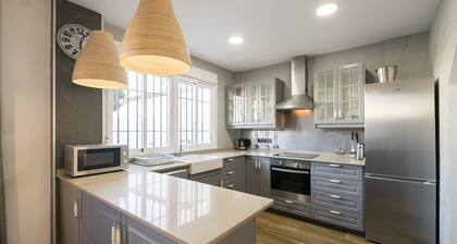 BEAUTIFUL DUPLEX - Charming house with shared pool and free WiFi.