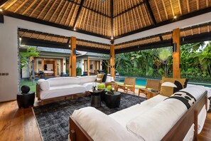 Luxury Villa | Living area | 40-inch Smart TV with digital channels, TV, Netflix - Villa Wolfe by Villa Finder (Seminyak)