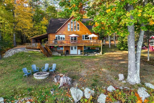 Lakefront, dog-friendly home with dock, kayaks, SUPs, canoe, huge deck & firepit
