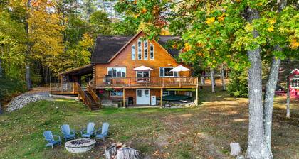 Lakefront, dog-friendly home with dock, kayaks, SUPs, canoe, huge deck & firepit