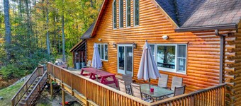 Lakefront, dog-friendly home with dock, kayaks, SUPs, canoe, huge deck & firepit