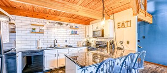 Spacious mountain-view townhome with pool, lake access & deck