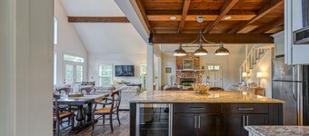 Beautiful lakefront home with fireplace, deck, central AC, & washer/dryer