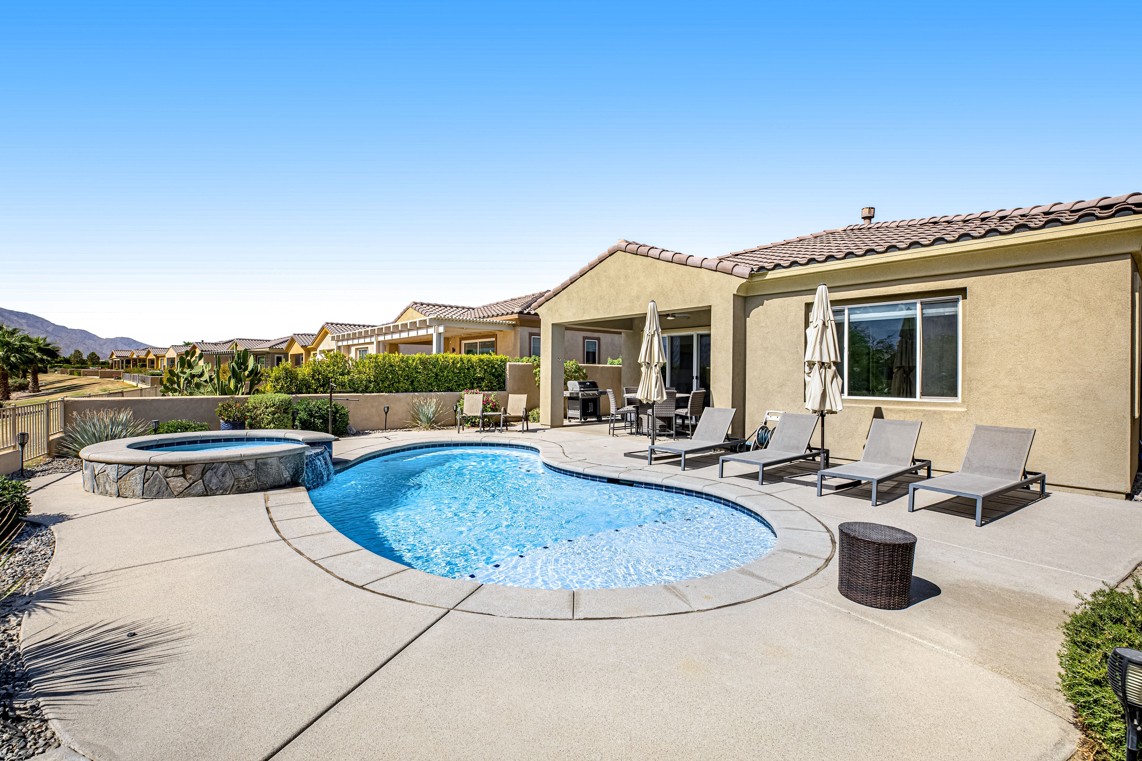 Enchanting dog-friendly home with pool spa, firepit, & washer/dryer