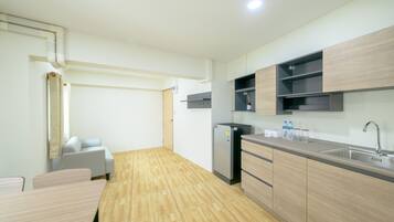 Exclusive Room | Living area | Flat-screen TV