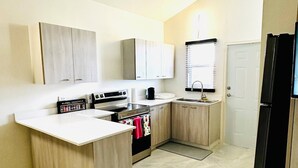 Coffee/tea maker, fridge, microwave, stovetop - Escape to Paradise Brand New Bungalow with Ocean View in Discovery Bay 1 (Discovery Bay)