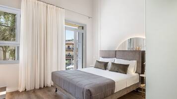 Suite, 2 Bedrooms, Balcony | Desk, soundproofing, free cribs/infant beds, free WiFi