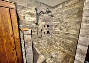 Jetted tub, hair dryer, towels, soap