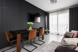 Appartement Confort, 1 chambre, balcon, vue fleuve | Coin séjour