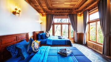 Suite Luxe, 2 chambres, balcon, vue montagne | Literie de qualité supérieure, minibar, coffres-forts dans les chambres