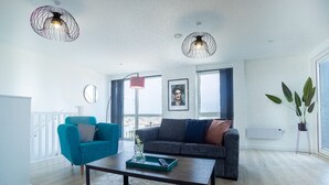 Deluxe-huoneisto, 2 makuuhuonetta, kaupunkinäköala | Oleskelualue