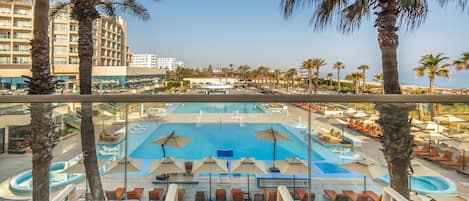 Suite, 1 Bedroom, Pool View | Egyptian cotton sheets, premium bedding, memory foam beds, minibar