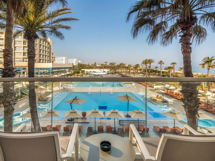 Suite, 1 Bedroom, Pool View | Egyptian cotton sheets, premium bedding, memory foam beds, minibar